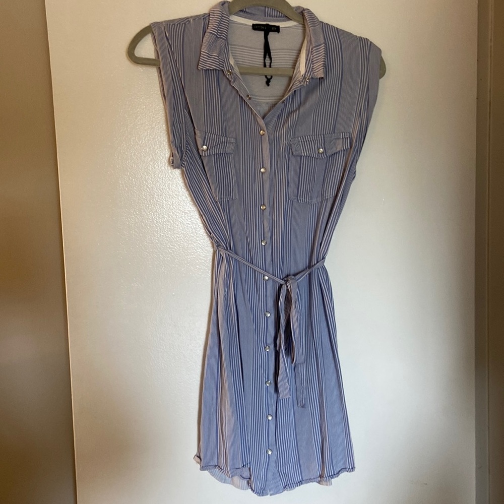 Light weight, lt blue and white stripe, pearl snap buttons and tie waist.